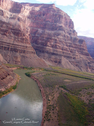 Color photo of the Grand Canyon and Colorado River from an areal view. Arizona, canyon rocks, green river.