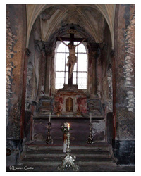 Photograph of Christ's altar in the Bone Ossuary Church in Kutna Hora, Czech Republic outside of Prague. Bone church, human remains, Gothic church, ossuary.